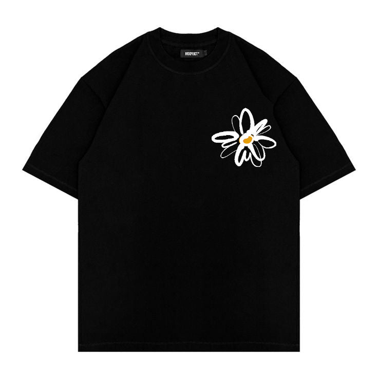 Black T-shirt with small white flower print on front and large abstract butterfly graphic on back