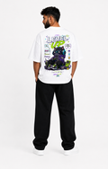 White oversized graphic T-shirt from the StitchVaults™ NOSTALGIA™ Collection featuring the Level Up gaming cat artwork inspired by retro arcade games, pixel graphics, controllers, and nostalgic gaming culture.