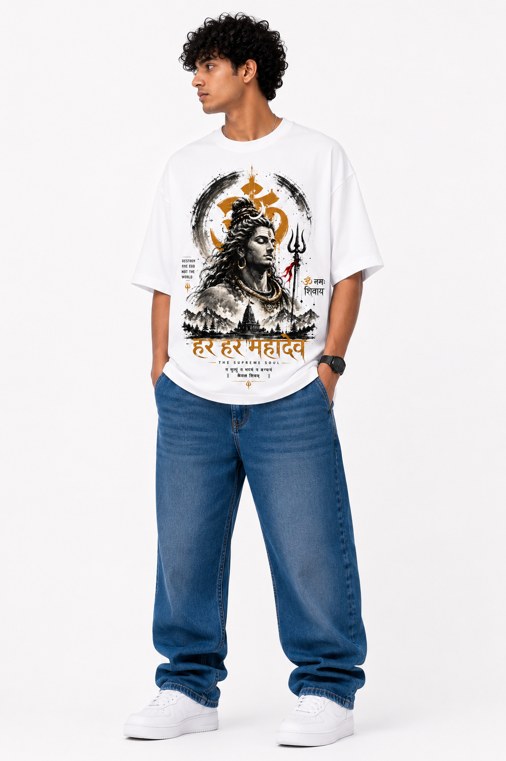 White oversized graphic T-shirt from the StitchVaults™ MAHADEV LEGACY™ Collection featuring a detailed Lord Shiva portrait with Om symbol, Trishul, temple artwork, and bold Har Har Mahadev typography.