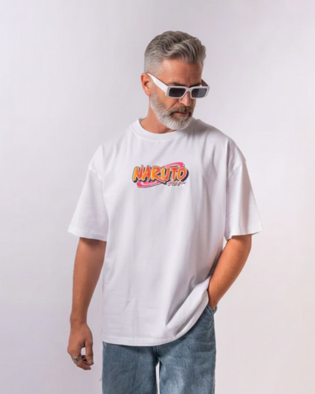 Naruto anime graphic t shirt with oversized fit in white streetwear style
