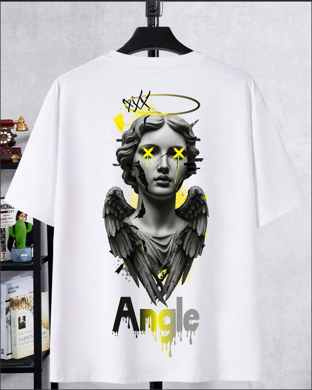Angel graphic t-shirt with winged statue illustration and artistic streetwear design on white cotton fabric