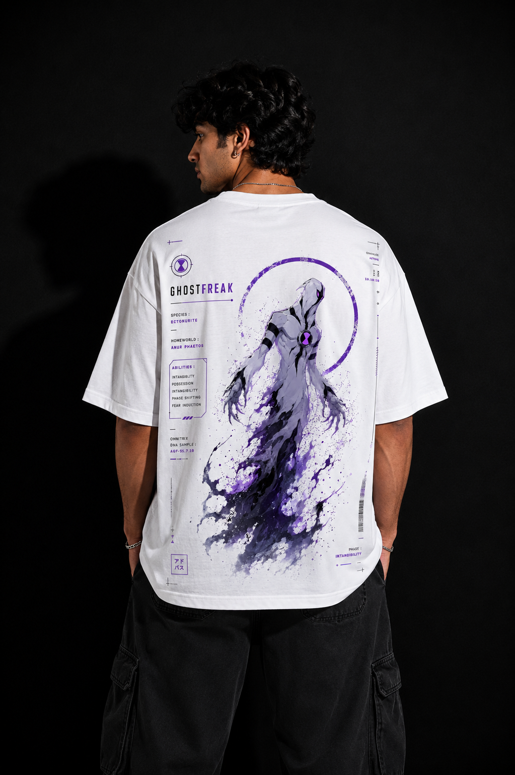 Person wearing a white t-shirt with a ghostfreak graphic design on the back against a black background