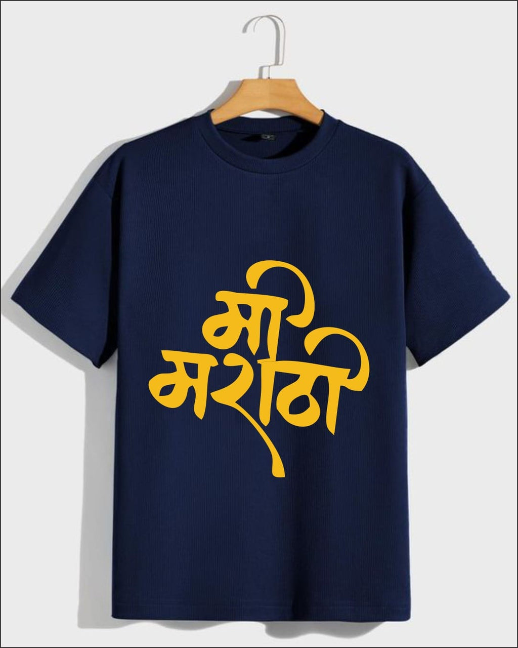 Limited Edition Mi Marathi Signature T-shirt featuring bold golden Marathi calligraphy on a premium navy blue fabric.