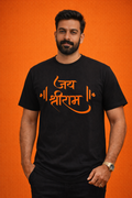 Man wearing a black t-shirt with Jai Shree Ram orange calligraphy design against an orange background.