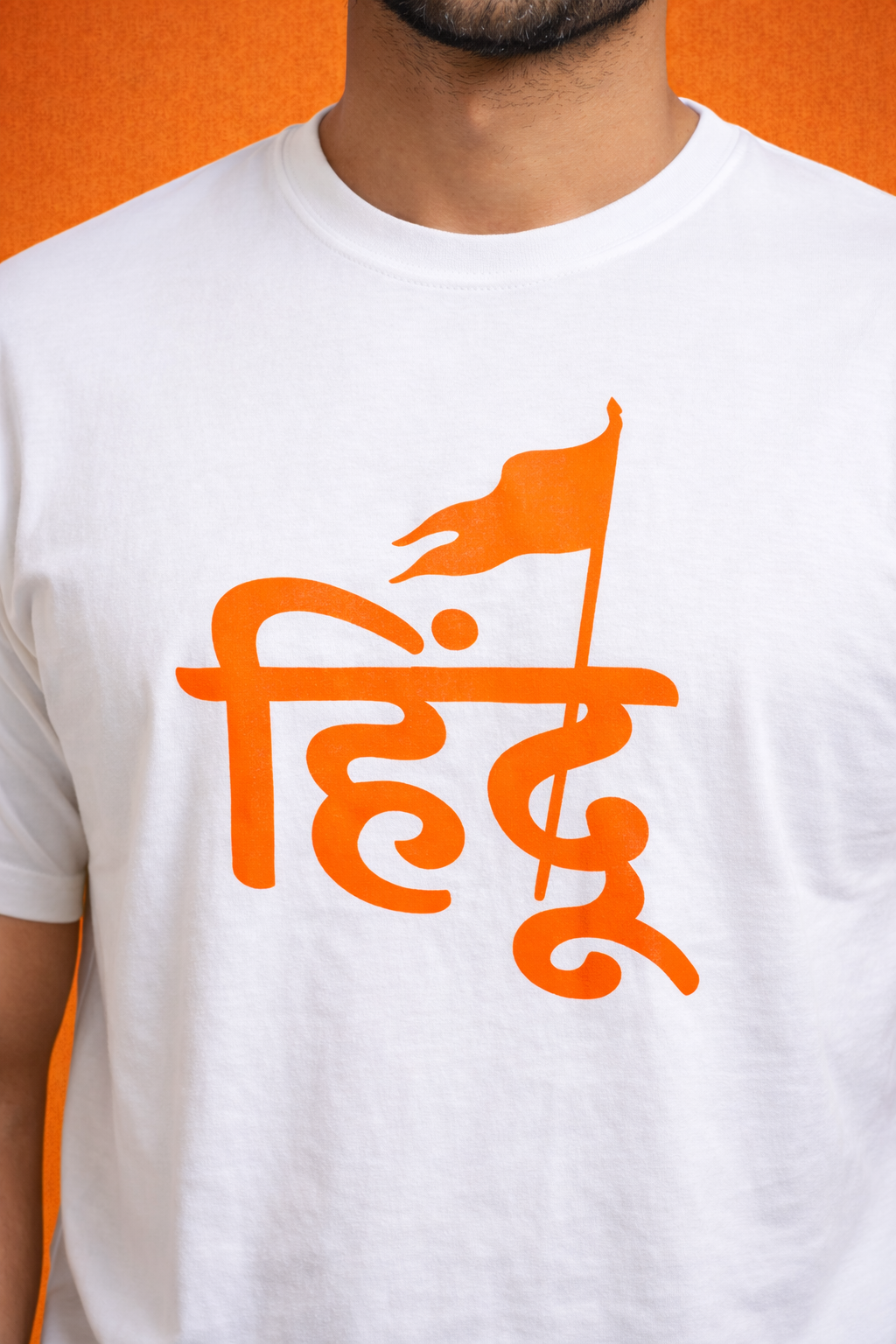 Hindu Flag White Tee – Studio Orange
(White “हिंदू” design tee )